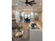 Open concept living and dining area with hardwood floors and abundant natural light at 408 Autry St, Norcross, GA 30071