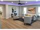 Open living area with hardwood floors, ambient lighting, and artwork at 408 Autry St, Norcross, GA 30071