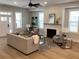 Bright and airy living room with hardwood floors, a fireplace and neutral decor at 408 Autry St, Norcross, GA 30071