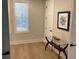 Bright home office with glass-top desk and hardwood floors at 408 Autry St, Norcross, GA 30071