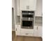 Double oven with microwave and white shaker cabinets at 408 Autry St, Norcross, GA 30071