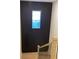 Elegant staircase with dark-painted wall and metal railing at 408 Autry St, Norcross, GA 30071