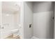 Basement bathroom with shower, toilet and laundry hookups at 803 New Horizon St, Powder Springs, GA 30127