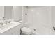 Clean bathroom with white vanity and shower/tub combo at 803 New Horizon St, Powder Springs, GA 30127