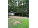 Backyard with shed and grassy area at 5595 Stagecoach Rd, Rex, GA 30273