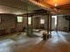 Unfinished basement with high ceilings and multiple windows at 5595 Stagecoach Rd, Rex, GA 30273