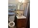 Clean bathroom with shower/tub and updated vanity at 5595 Stagecoach Rd, Rex, GA 30273