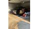 Attached garage with car and various storage items at 5595 Stagecoach Rd, Rex, GA 30273