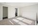Simple bedroom with carpet flooring and a large closet at 279 Lewis Way, Canton, GA 30115