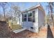 Gray manufactured home with wooden steps and black shutters at 279 Lewis Way, Canton, GA 30115