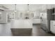 Modern kitchen with white cabinets, granite counters, and island at 279 Lewis Way, Canton, GA 30115