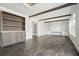 Spacious living area with built-in shelving and hardwood floors at 279 Lewis Way, Canton, GA 30115