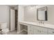 Bright bathroom with a double vanity, a closet and plenty of counter space at 4315 Orchard Park Ct, Stone Mountain, GA 30083