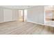 Bright bedroom with wood-look flooring and neutral paint colors at 4315 Orchard Park Ct, Stone Mountain, GA 30083
