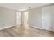 Bright bedroom with luxury vinyl plank flooring, closet and attached bathroom at 4315 Orchard Park Ct, Stone Mountain, GA 30083