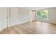 Bright bedroom with plank flooring, featuring ample natural light and closet space at 4315 Orchard Park Ct, Stone Mountain, GA 30083