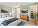 Cozy bedroom with ample natural light and a full-sized closet at 4315 Orchard Park Ct, Stone Mountain, GA 30083