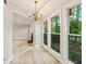 Cozy breakfast nook with chandelier lighting, adjacent to the living area at 4315 Orchard Park Ct, Stone Mountain, GA 30083
