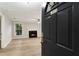 Welcoming entryway with a black door and a view of the living room at 4315 Orchard Park Ct, Stone Mountain, GA 30083