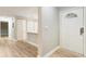 Inviting entryway with laminate floors and ample storage space at 4315 Orchard Park Ct, Stone Mountain, GA 30083