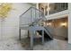 View of metal staircase and neutral siding at 4315 Orchard Park Ct, Stone Mountain, GA 30083