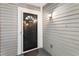 Charming front door with decorative details and exterior lighting at 4315 Orchard Park Ct, Stone Mountain, GA 30083
