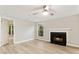 Cozy living room featuring a fireplace and plenty of natural light at 4315 Orchard Park Ct, Stone Mountain, GA 30083
