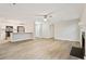 Open living area connecting the kitchen and featuring a fireplace with plenty of room to relax at 4315 Orchard Park Ct, Stone Mountain, GA 30083
