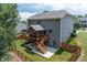 Two-story house with large deck, screened porch, and fenced backyard at 138 Stargaze Rdg, Canton, GA 30114