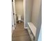 Small bathroom with toilet and built-in bench at 5015 Renvyle Dr. (Lot 12) Dr, Atlanta, GA 30339