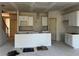 Spacious kitchen with white cabinets and an island at 5015 Renvyle Dr. (Lot 12) Dr, Atlanta, GA 30339