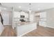 Modern kitchen with white cabinets and granite counters at 5015 Renvyle Dr. (Lot 12) Dr, Atlanta, GA 30339