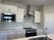 Well-equipped kitchen with stainless appliances and quartz countertops at 5015 Renvyle Dr. (Lot 12) Dr, Atlanta, GA 30339