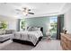 Inviting main bedroom with a ceiling fan, tray ceiling, and dual windows at 5015 Renvyle Dr. (Lot 12) Dr, Atlanta, GA 30339