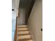 Unfinished staircase with wood railings leading to the upper level at 5015 Renvyle Dr. (Lot 12) Dr, Atlanta, GA 30339