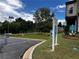 Street view of new construction with signs and landscaped grass in front of parking lot at 5015 Renvyle Dr. (Lot 12) Dr, Atlanta, GA 30339