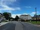 Street view of new construction with landscaped yard with newly built homes and a street view at 5015 Renvyle Dr. (Lot 12) Dr, Atlanta, GA 30339