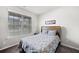 Comfortable bedroom with a neutral palette and a large window at 5410 Whisper Ct, Cumming, GA 30028