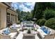 Outdoor patio with seating area and pool view at 420 Windship Pl, Sandy Springs, GA 30327