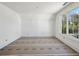 Bright bedroom featuring a large window and recessed lighting at 235 River Valley Court Lot 4 Ct, Atlanta, GA 30328