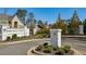 Stone entrance to River Valley Reserve community with manicured landscaping and a welcoming gate at 235 River Valley Court Lot 4 Ct, Atlanta, GA 30328