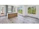 Spacious open living space with large windows, custom cabinets and a bright, airy feel at 235 River Valley Court Lot 4 Ct, Atlanta, GA 30328