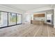 Open living space with large sliding glass doors to the deck, light wood island and modern design at 235 River Valley Court Lot 4 Ct, Atlanta, GA 30328