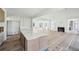 Open-concept layout showcasing a modern kitchen, fireplace, and stylish design elements at 235 River Valley Court Lot 4 Ct, Atlanta, GA 30328