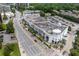 Aerial view of commercial buildings and apartments with parking at 1735 Peachtree Ne St # 321, Atlanta, GA 30309