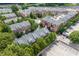 Aerial view of complex with beautiful landscaped area, pool, and parking at 1735 Peachtree Ne St # 321, Atlanta, GA 30309