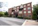 Elegant brick building with balconies, well-manicured landscaping, and desirable location at 1735 Peachtree Ne St # 321, Atlanta, GA 30309