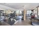 Well-equipped gym featuring weights, machines, mirrors, and natural light at 1735 Peachtree Ne St # 321, Atlanta, GA 30309