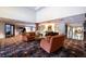 Elegant lobby area with comfortable seating, piano, and stylish decor at 1735 Peachtree Ne St # 321, Atlanta, GA 30309