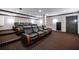 Home theater featuring comfortable seating, tiered levels, and optimal viewing experience at 1735 Peachtree Ne St # 321, Atlanta, GA 30309